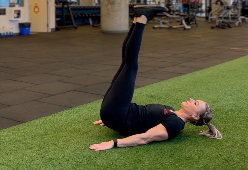 Fitness instructor doing exercise